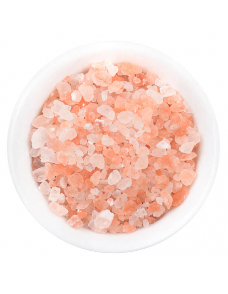 Pink crystal salt coarse Gourmet spice in a glass