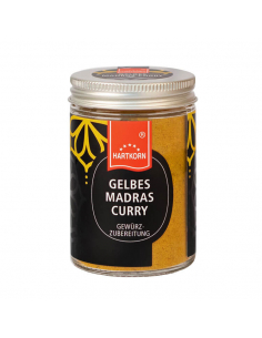 Yellow Madras Curry, mild gourmet spice in a glass